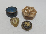Lote de 4 caixas decorativas, sendo em metal, pedra e papel marchê Medindo a maior 7,5cm x 3,5cm de altura.