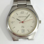 TECHNOS - Relógio quartz, não testado. Pulseira: 21mm. Caixa: 4cm x 3,6cm, vertical x horizontal, sem contar a coroa.  ATENÇÃO! Produto sendo vendido conforme ESTADO, testado, ou não, diz respeito apenas do momento da catalogação. Se necessário, solicitar mais fotos, vídeos ou perguntas para análise via e-mail reidaantiguidade@gmail.com, Obrigado pela visita!