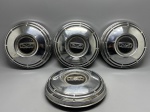 AUTO PEÇAS - Antigo jogo de calotas F1000 - F100 em inox. Med. 25 cm. Marcas do tempo e de uso.