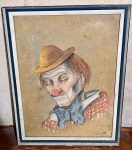 Quadro de palhaço com olhos fechados e cabeça baixa assinado `Goulart` emoldurado em madeira com tons azuis e prata - dim - 51x66x4