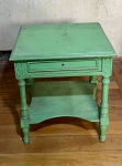 Mesa lateral produzida em madeira com gaveta, (puxador decorado com imagem de rosa e ornamento dourado), detalhes entalhados e pintura verde - dim - 51x40x56
