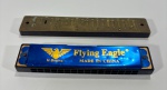 Lote com 1 gaita Flying Eagle produzida na China e a parte interior de outra gaita - maior 16x3x1 menor 13x3x2