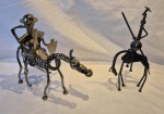 Duas esculturas em ferro representando Don Quixote medindo 22 cm de altura.