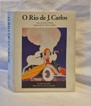 Livro O Rio de Janeiro de J. Carlos medindo 29 cm por 23 cm.