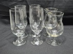 Lote de 6 taças de água, suco em vidro, sendo 2 modelos. Medindo a maior 6cm x 17cm de altura.