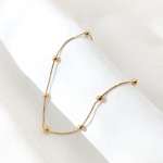 Pulseira de bolinhas em ouro amarelo 18k