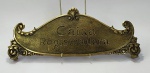 COLECIONISMO - PLACA ou CRISTA em Bronze, a qual era parafusada no topo da Máquina Registradora Antiga. Não temos como garantir a originalidade nem a origem da peça. Mede aprox. 35 cm de comprimento.