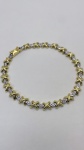 PULSEIRA CONFECCIONADO EM OURO AMARELO E OURO BRANCO 18K, COM 20 DIAMANTES, PESO: 15,2g, TAMANHO: 18