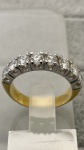MEIA ALIANÇA CONFECCIONADO EM OURO AMARELO E BRANCO 18K, COM 8 DIAMANTES DE 11 PONTOS CADA 0,88Ct CO