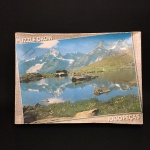PUZZLEGROW - Antigo quebra cabeça "Reflexos no lago". Total de 1000  peças. Possivelmente completo. Dimensões: 27 cm x 38 cm.