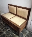 Antigo  e raro banco em madeira com encosto e assento em tecido e compartimento na parte inferior. Dimensões: 80 cm x 50 cm x 100 cm aproximadamente.