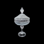 Compoteira alta em demi cristal com lapidação no padrão bico de jaca e pega em formato de pinha, med. Alt. 29cm e diam. 15cm.