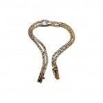 Pulseira infantil em ouro 14k com dupla corrente e pedra brilhante central.  Med. 13cm de comp. Peso:  5gr.