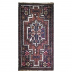 Tapete oriental em lã e algodão nas tonalidades predominantes azul e marrom. Medidas:   71cm X 131cm