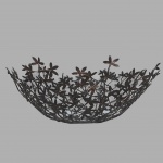 ETHNIX - Centro de mesa em metal vazado. Medidas: Altura 11cm e Diâmetro 50cm.