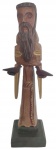Escultura em madeira, esculpida manualmente representando São Francisco.  Medidas: 40 cm de altura, 10 cm de largura e 12 cm de comprimento.