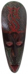 Totem em madeira esculpida e pintada artesanalmente, representando máscara. Obs: Retirada pelo comprador. Medidas: 50 x 20 cm.