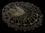 Lindo broche em prata, com trabalhos em filigrama, peso 5g.