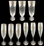 Lote com 9 taças flute com tamanhos diversos. Medidas do maior: 27 cm de altura e 4 cm de diâmetro.
