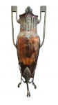 Grande floreiro em metal espessurado a prata com detalhes artesanais e duas alças laterais obs necessita de limpeza na Prata medidas altura 45 cm largura 12 cm e comprimento 18 cm