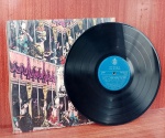 Disco de Vinil com marcas do tempo.
