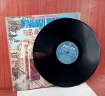 Disco de Vinil com marcas do tempo.