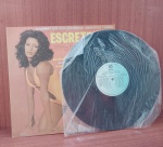 Disco de Vinil com marcas do tempo.