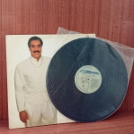 Disco de Vinil com marcas do tempo.