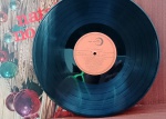 Disco de Vinil com marcas do tempo.