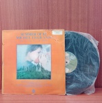 Disco de Vinil com marcas do tempo.