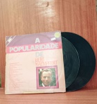 Disco de Vinil com marcas do tempo.