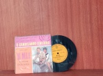 Disco de Vinil com marcas do tempo.