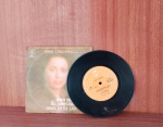 Disco de Vinil com marcas do tempo.