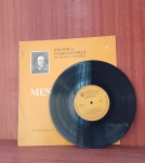 Disco de Vinil com marcas do tempo.