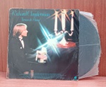 Disco de Vinil com marcas do tempo.