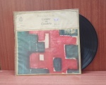 Disco de Vinil com marcas do tempo.