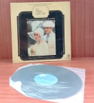 Disco de Vinil com marcas do tempo.