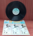 Disco de Vinil com marcas do tempo.