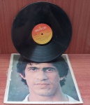 Disco de Vinil com marcas do tempo.