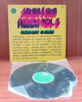 Disco de Vinil com marcas do tempo.