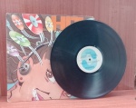 Disco de Vinil com marcas do tempo.