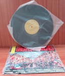 Disco de Vinil com marcas do tempo.