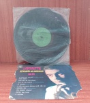 Disco de Vinil com marcas do tempo.
