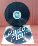 Disco de Vinil com marcas do tempo.