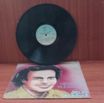 Disco de Vinil com marcas do tempo.