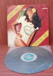 Disco de Vinil com marcas do tempo.