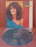 Disco de Vinil com marcas do tempo.