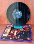 Disco de Vinil com marcas do tempo.