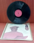 Disco de Vinil com marcas do tempo.