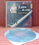 Disco de Vinil com marcas do tempo.